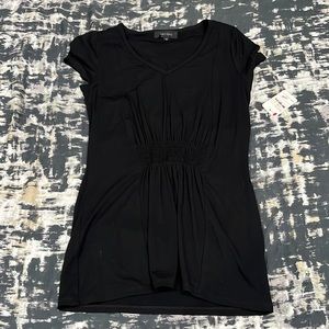 Woman’s black top